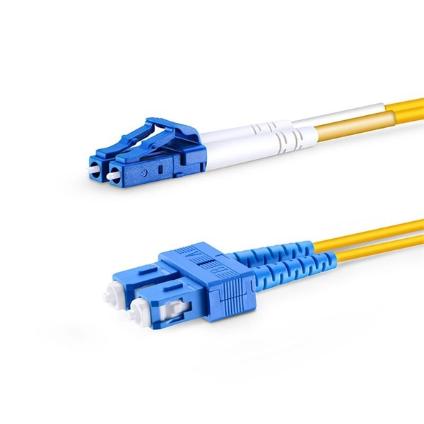 Can fiber optic cables and electrical cables be stored in the same well